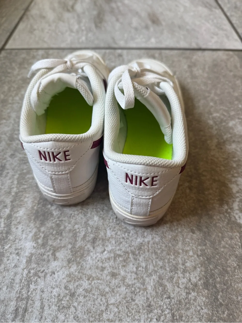 Nike White Low-Top Sneakers with Plum Swoosh and Neon Green Insoles